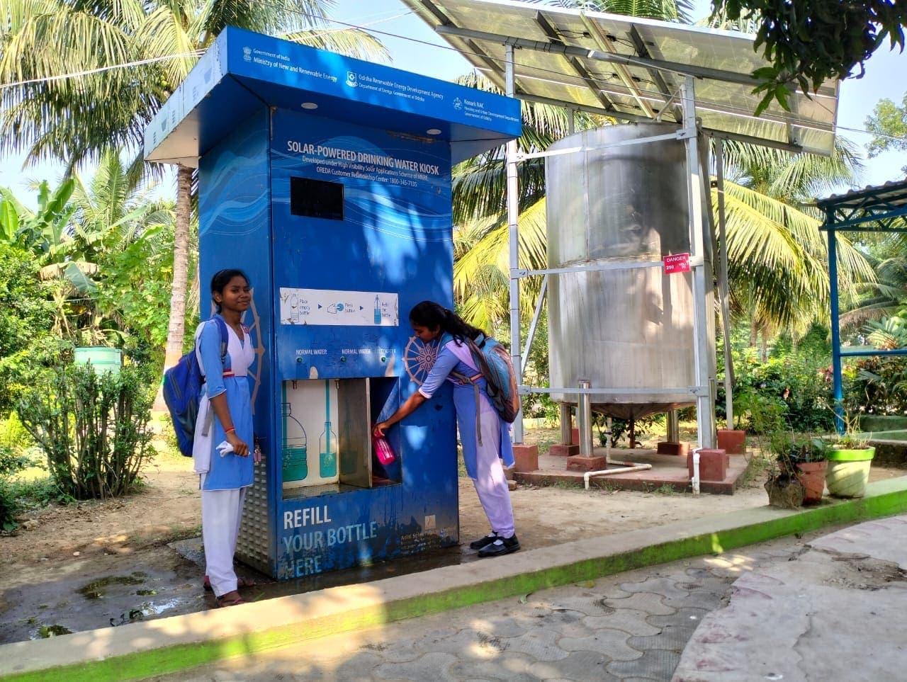 Solar-powered Arosia water kiosk in Konark, Odisha, used by local schoolchildren